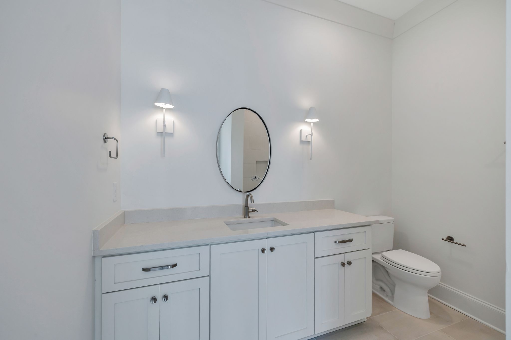 6037 Whitman Road, Unit 203 Franklin, TN 37064 - Photo 38 of 52 a bathroom with a toilet sink and mirror