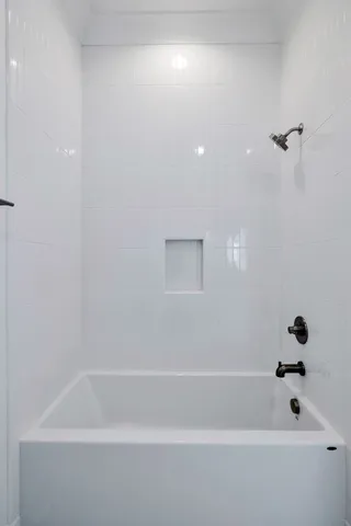 a bathroom with a bathtub