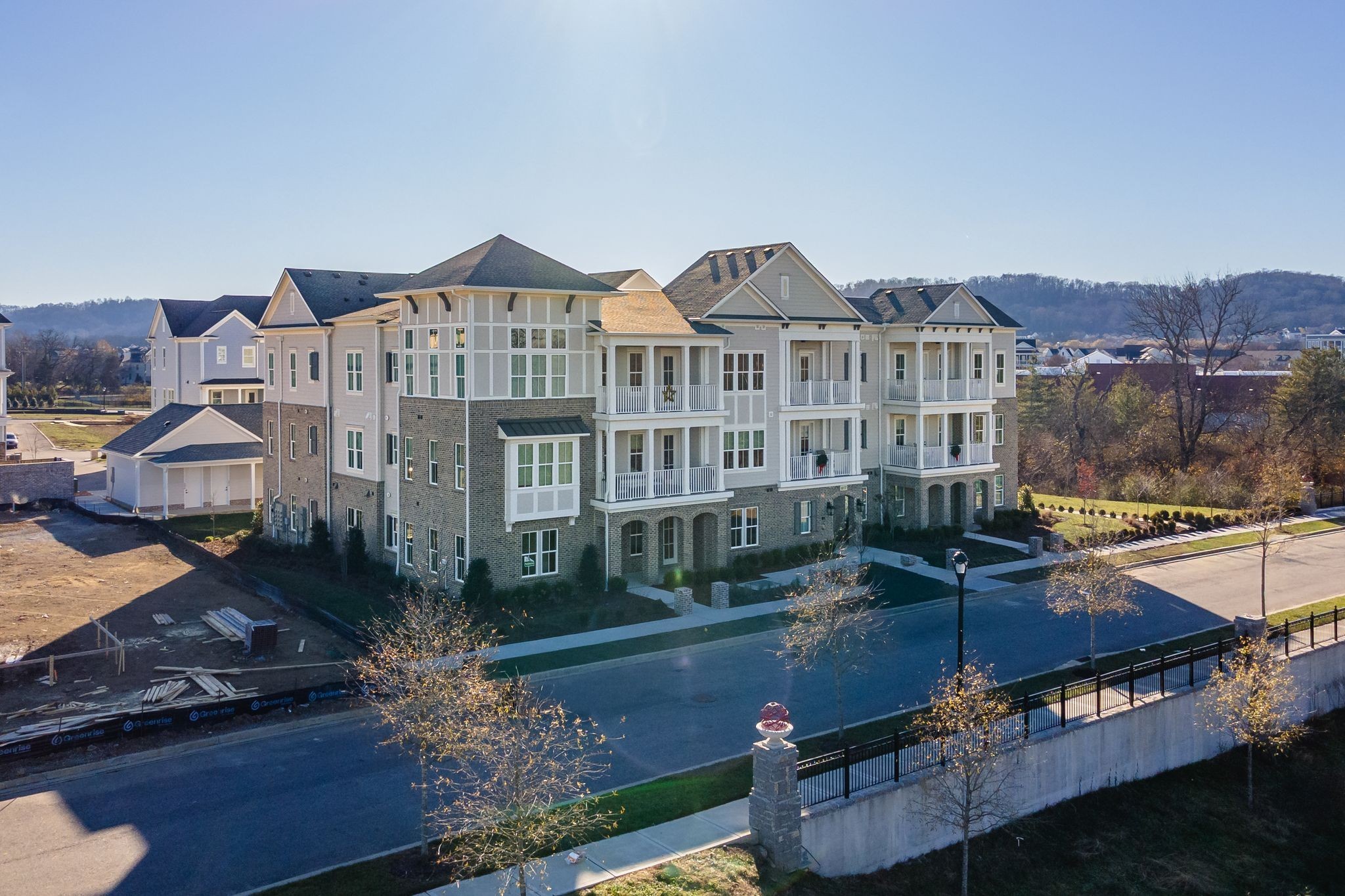 6037 Whitman Road, Unit 203 Franklin, TN 37064 - Photo 51 of 52 a front view of a house with yard and mountain view in back