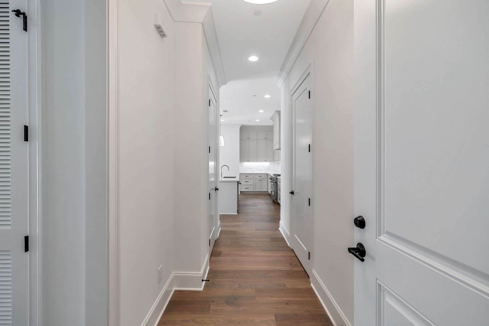 6037 Whitman Road, Unit 203 Franklin, TN 37064 - Photo 7 of 52 a view of a hallway with wooden floor
