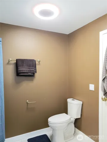 a bathroom with a toilet