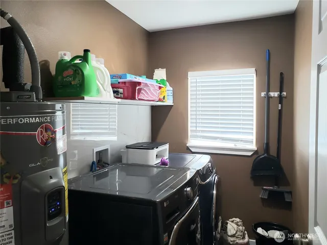 a front view of house with yard and trees