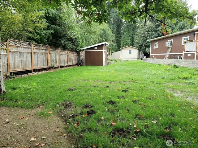 a view of a car in front of a house