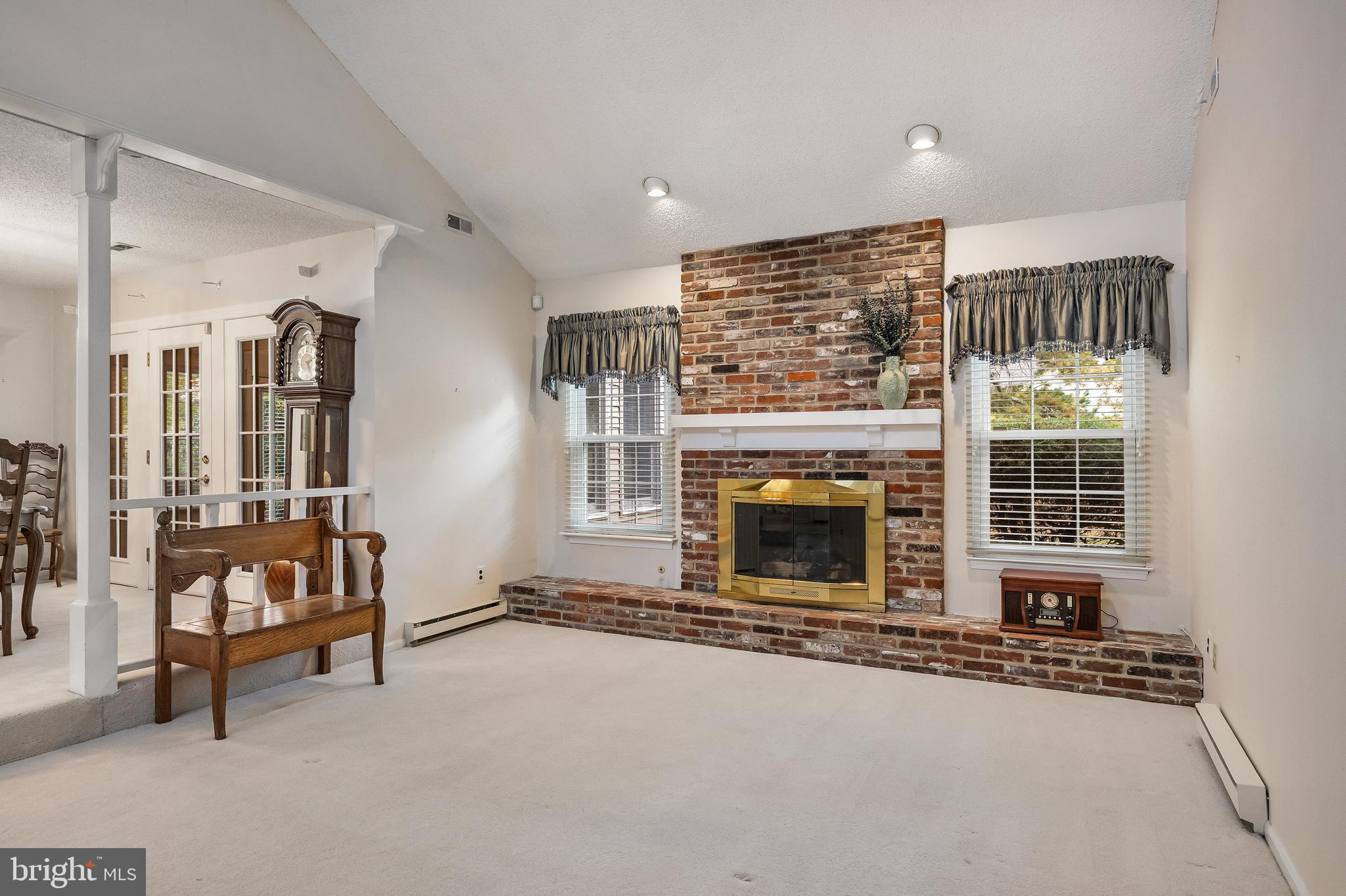 2 Nantucket Court Medford, NJ 08055 - Photo 7 of 32 Brick gas fireplace and carpeted flooring