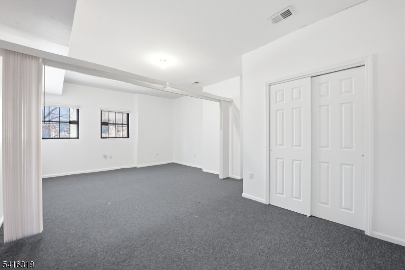 44 3rd Street Newark, NJ 07107 - Photo 11 of 12 a view of a livingroom with an entryway