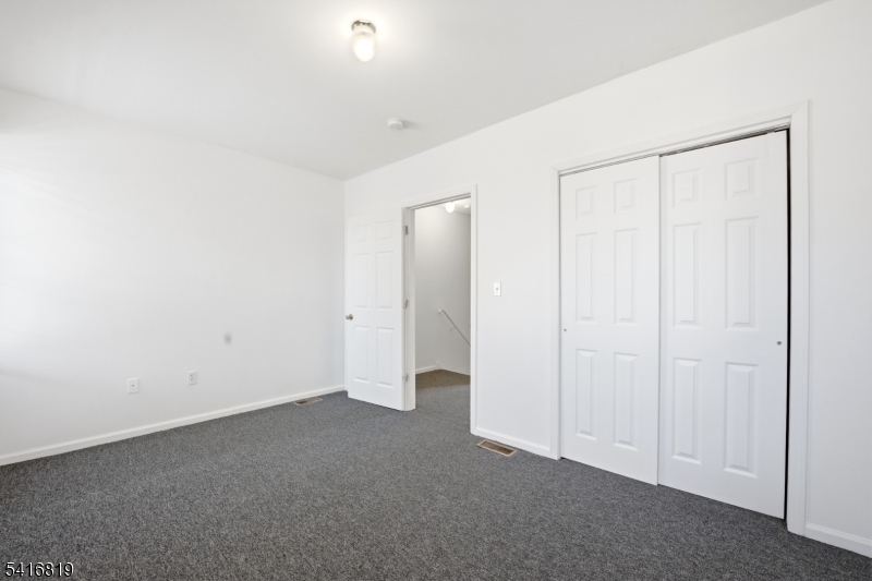 44 3rd Street Newark, NJ 07107 - Photo 7 of 12 a view of an empty room