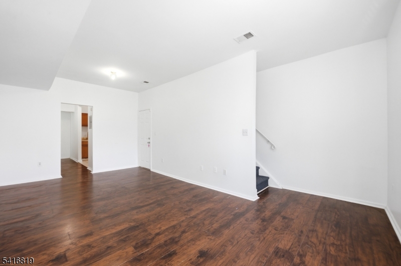 44 3rd Street Newark, NJ 07107 - Photo 10 of 12 a view of empty room with wooden floor
