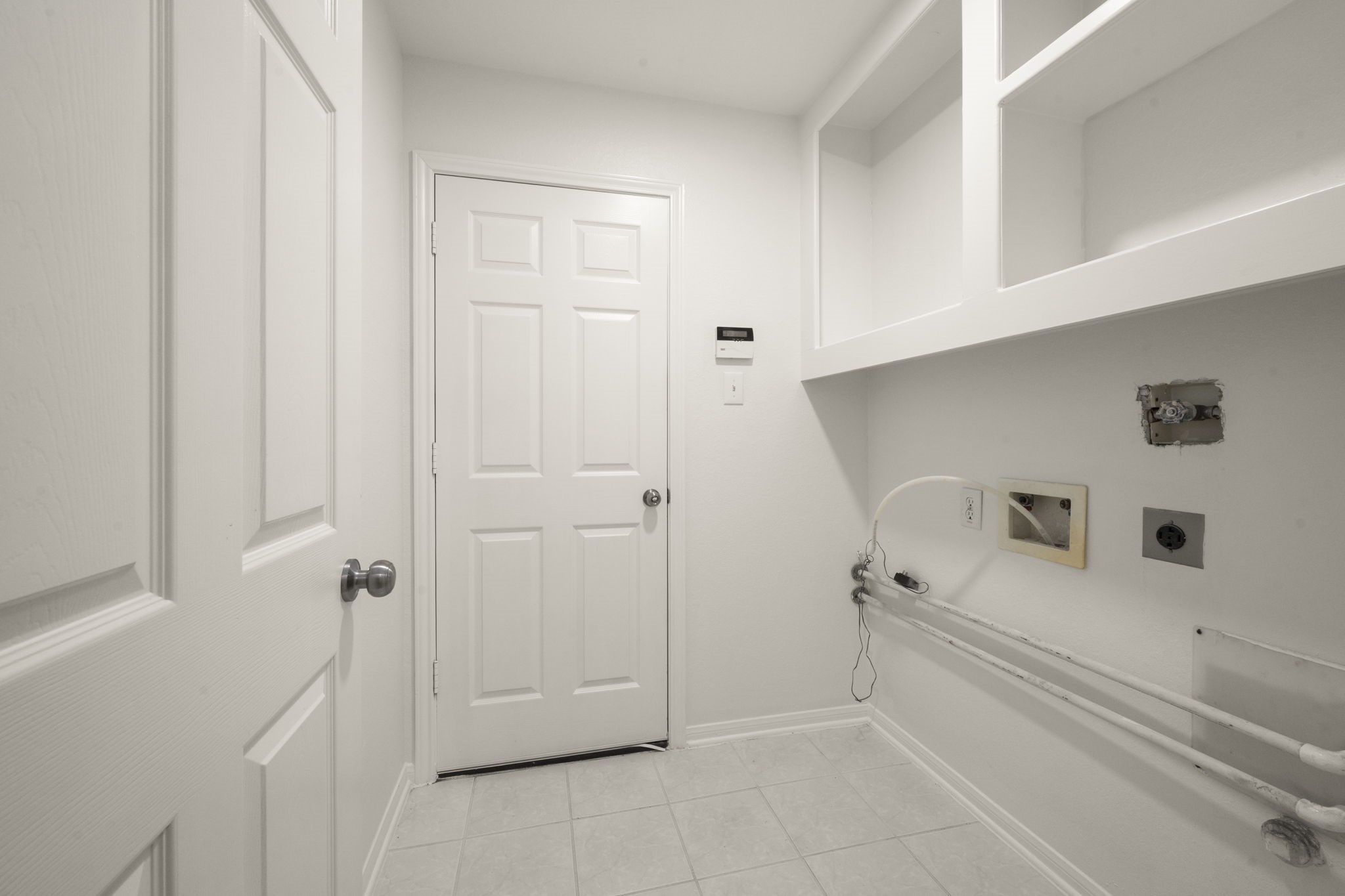2018 Copperwood Park Lane Spring, TX 77386 - Photo 14 of 33 a bathroom with a bathtub and a shower