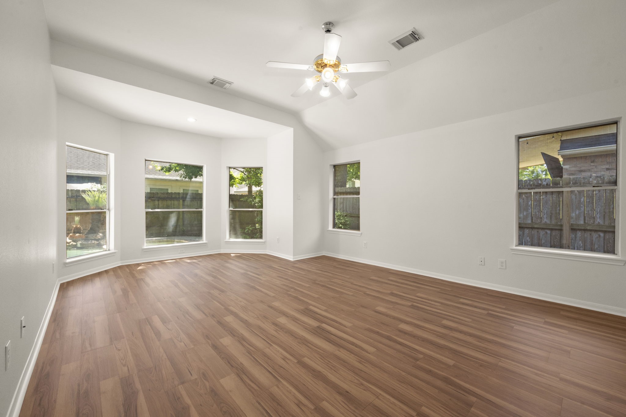 2018 Copperwood Park Lane Spring, TX 77386 - Photo 27 of 33 a view of an room with wooden floor and windows