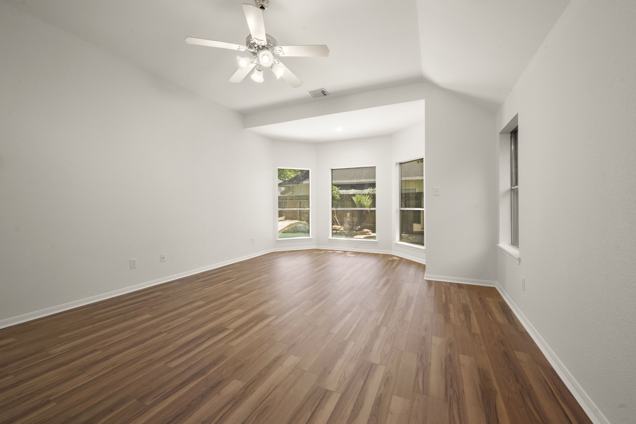 2018 Copperwood Park Lane Spring, TX 77386 - Photo 28 of 33 wooden floor in an empty room with a window