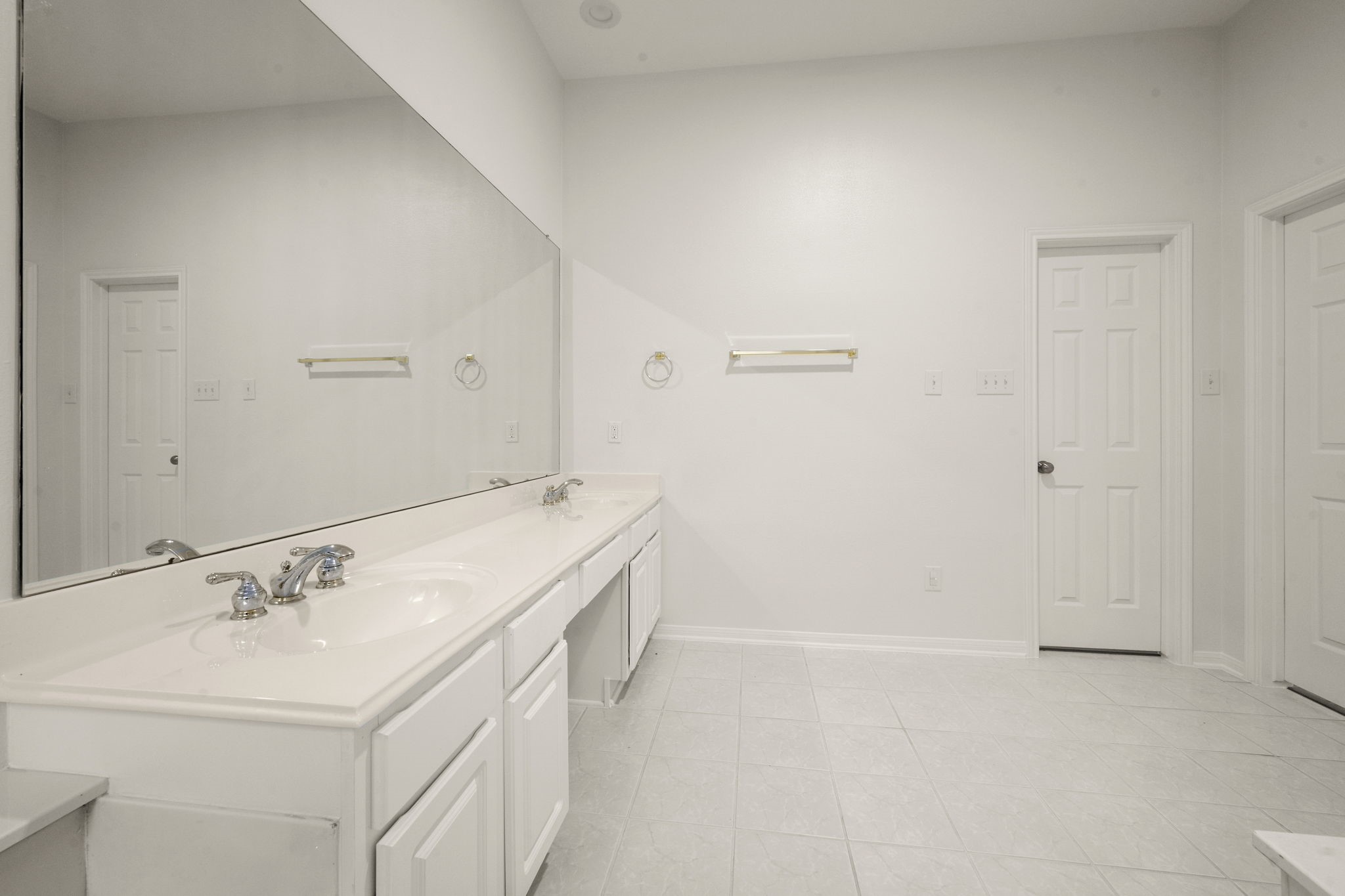 2018 Copperwood Park Lane Spring, TX 77386 - Photo 30 of 33 a bathroom with a sink and a mirror