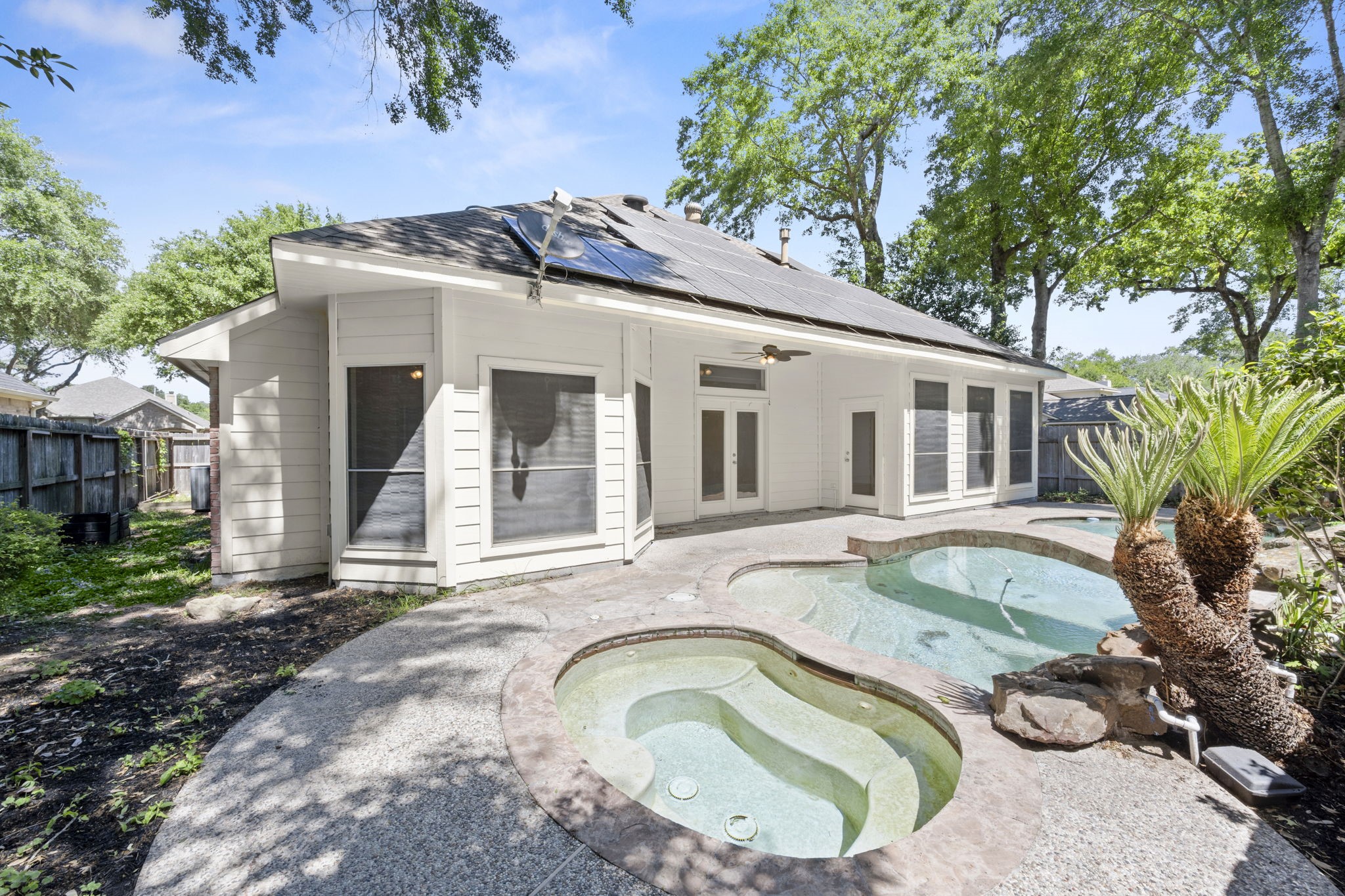 2018 Copperwood Park Lane Spring, TX 77386 - Photo 6 of 33 a house view with a swimming pool