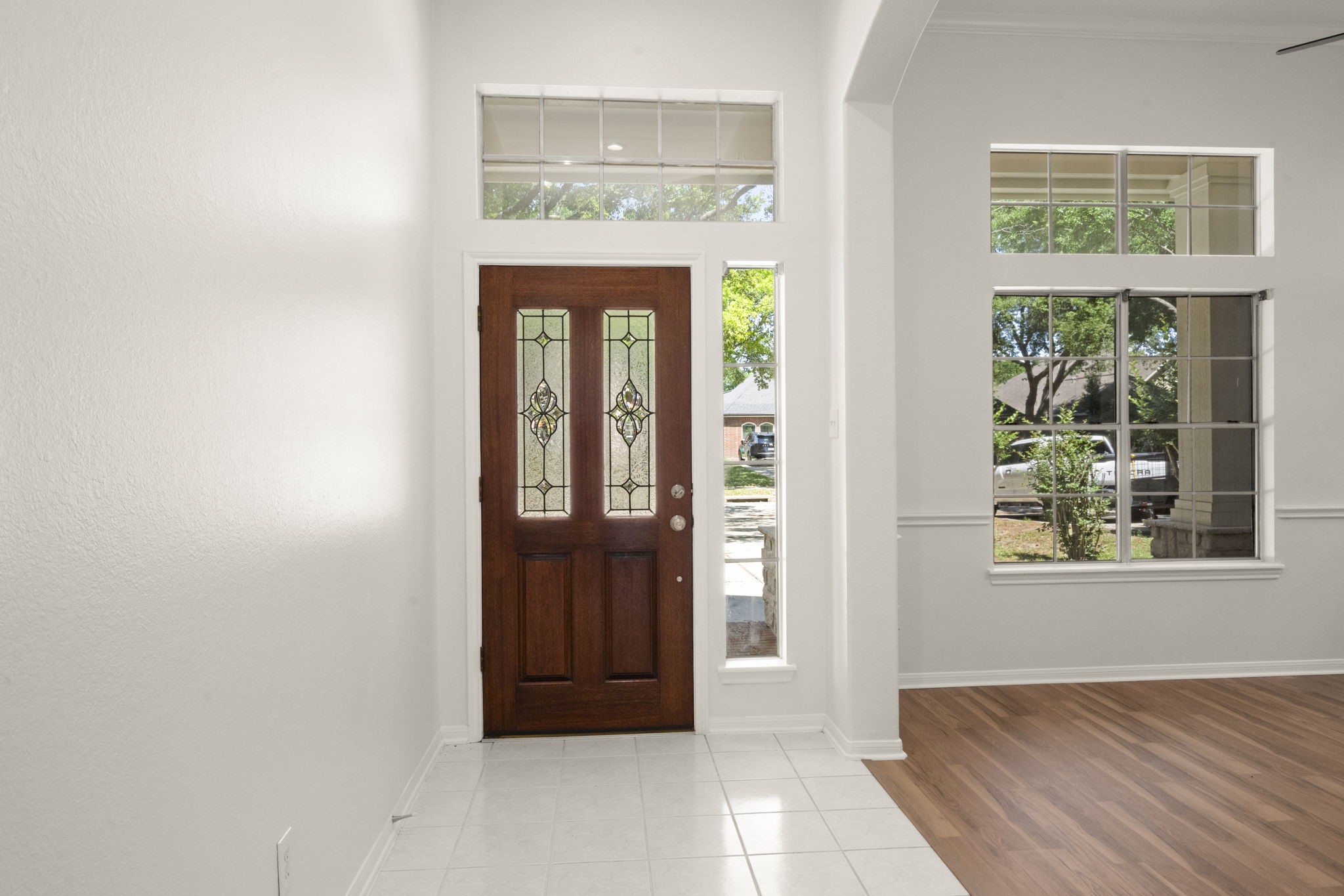 2018 Copperwood Park Lane Spring, TX 77386 - Photo 9 of 33 an entryway with wooden floor windows and entryway