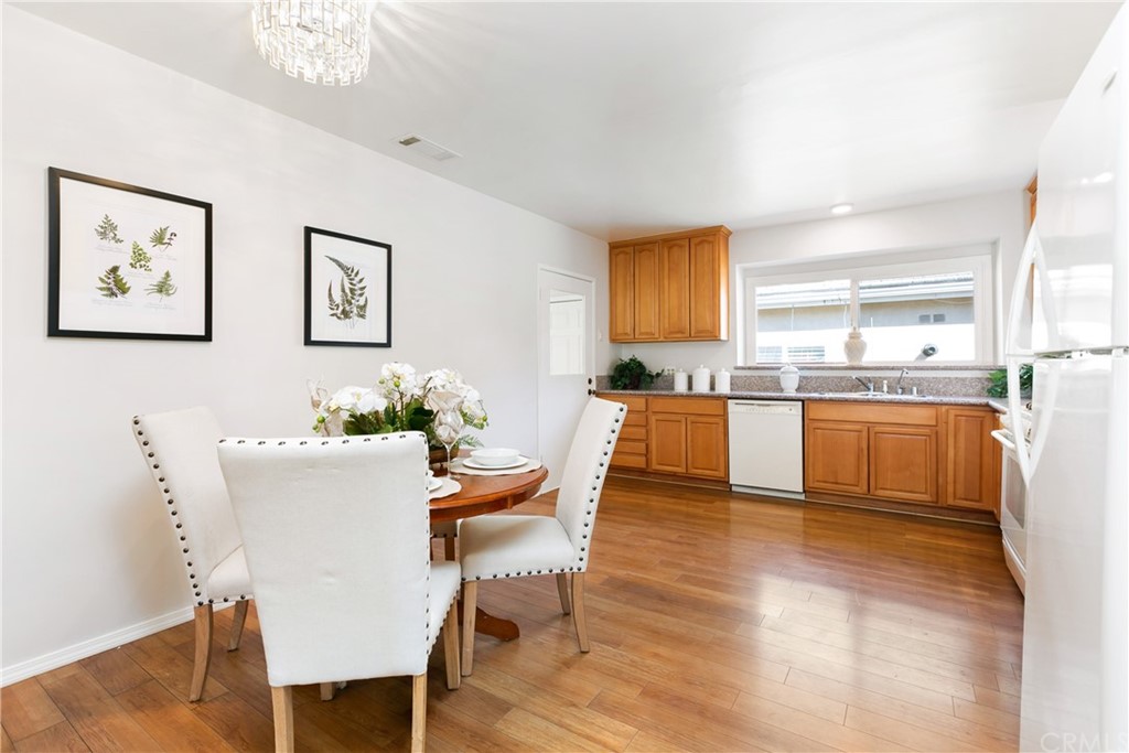 3605 East Del Mar Boulevard Pasadena, CA 91107 - Photo 11 of 22 a living room with stainless steel appliances kitchen island granite countertop furniture and a kitchen view