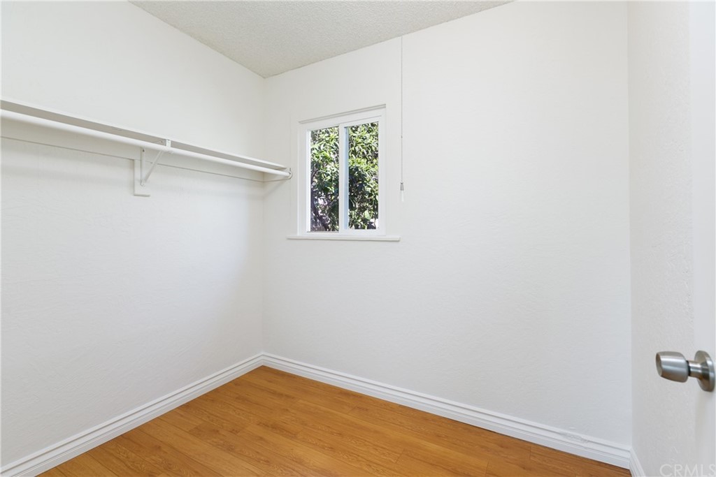 3605 East Del Mar Boulevard Pasadena, CA 91107 - Photo 17 of 22 a view of a small space with wooden floor and a window