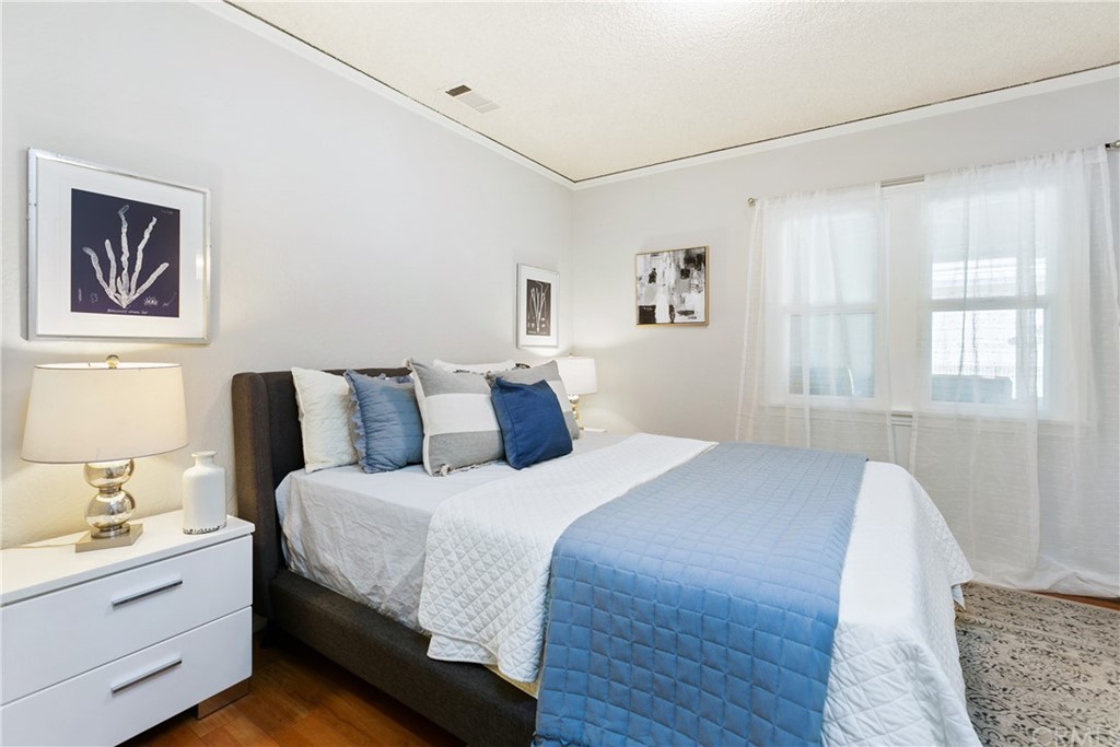 3605 East Del Mar Boulevard Pasadena, CA 91107 - Photo 21 of 22 a bed room with a bed and a window