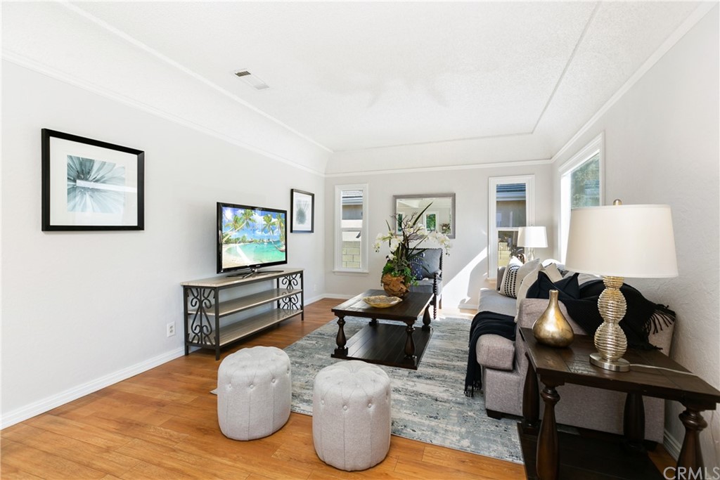 3605 East Del Mar Boulevard Pasadena, CA 91107 - Photo 6 of 22 a living room with furniture and a wooden floor