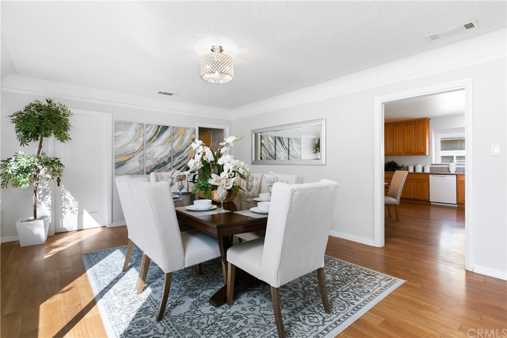 3605 East Del Mar Boulevard Pasadena, CA 91107 - Photo 10 of 22 a living room with furniture and wooden floor