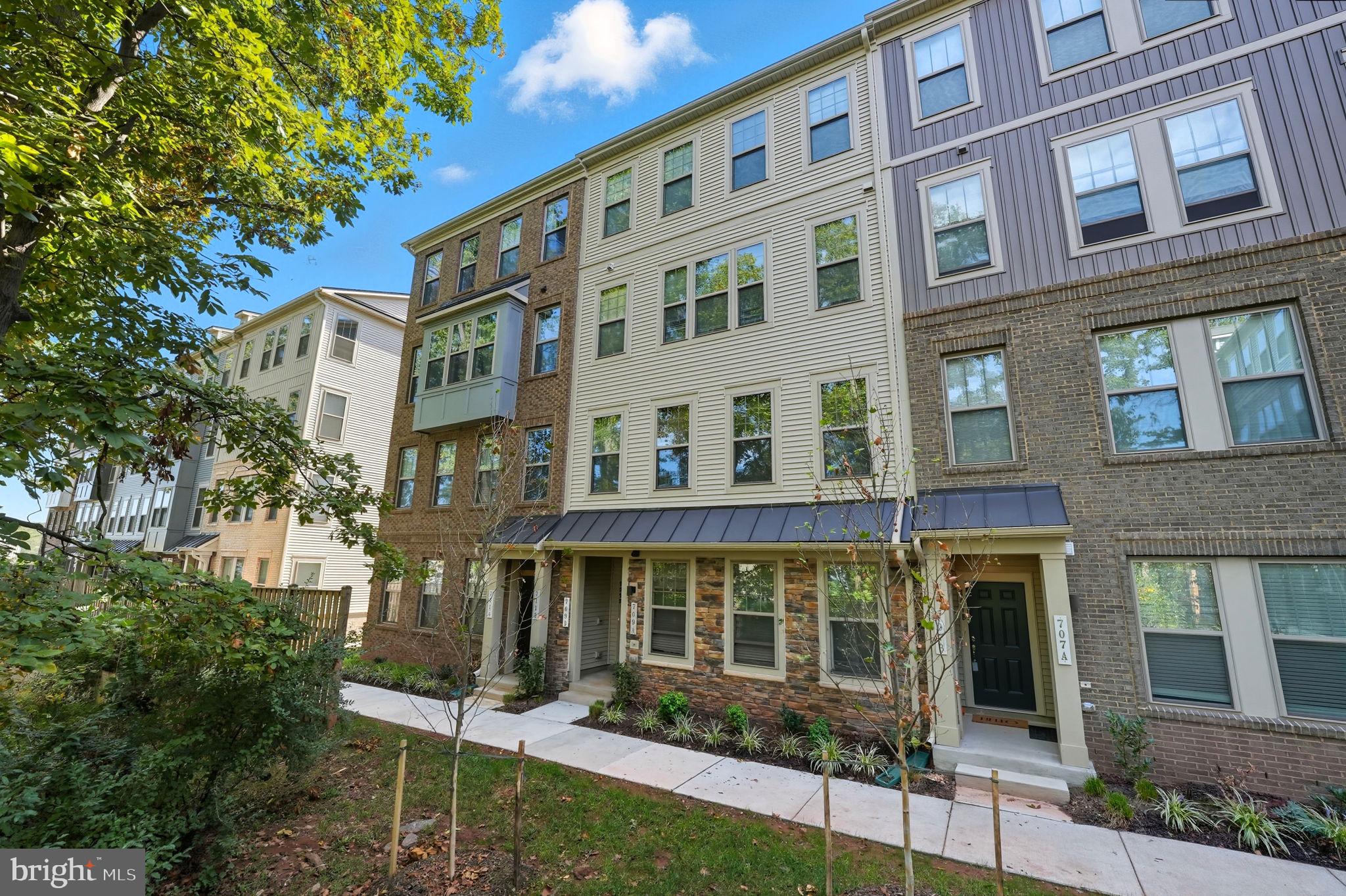 a front view of a building with garden