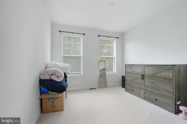 a room with furniture and window