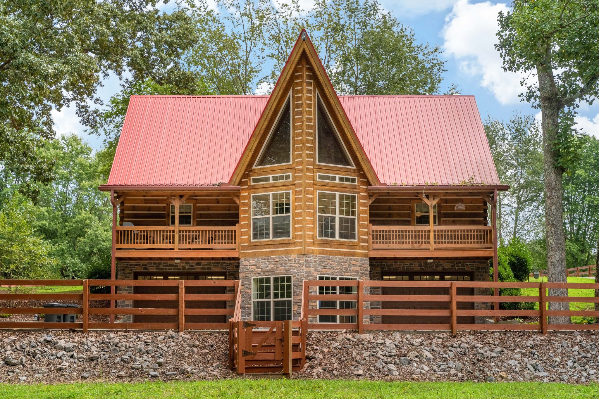 1313 B Academy Road Portland, TN 37148 - Photo 1 of 1 a view of a house with a yard and wooden fence