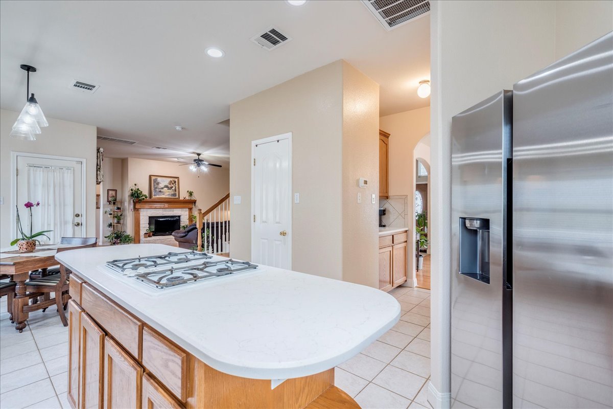 1077 Fairway Kyle, TX 78640 - Photo 40 of 40 a large kitchen with a table and chairs