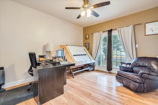 a kitchen with sink and cabinets
