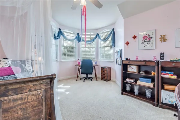 a living room with closet and a window