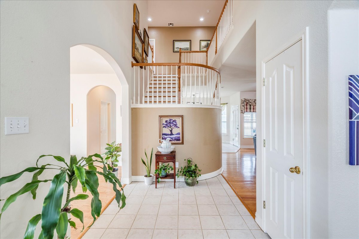 1077 Fairway Kyle, TX 78640 - Photo 5 of 40 a view of entryway with livingroom and potted plants