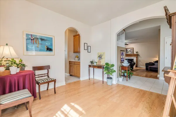 a bed room with a bed and a chair