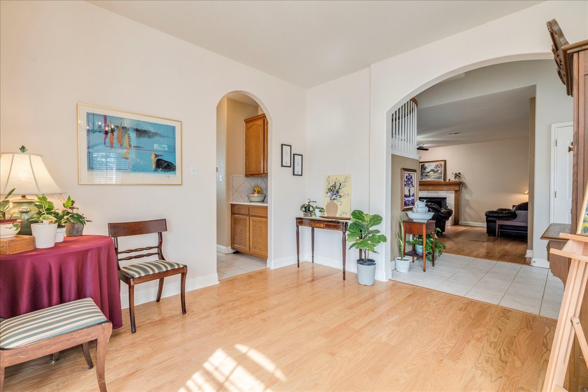 1077 Fairway Kyle, TX 78640 - Photo 8 of 40 a bed room with a bed and a chair