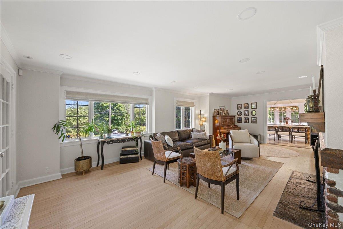 311 Lyncroft Road New Rochelle, NY 10804 - Photo 6 of 39 a living room with furniture and a large window