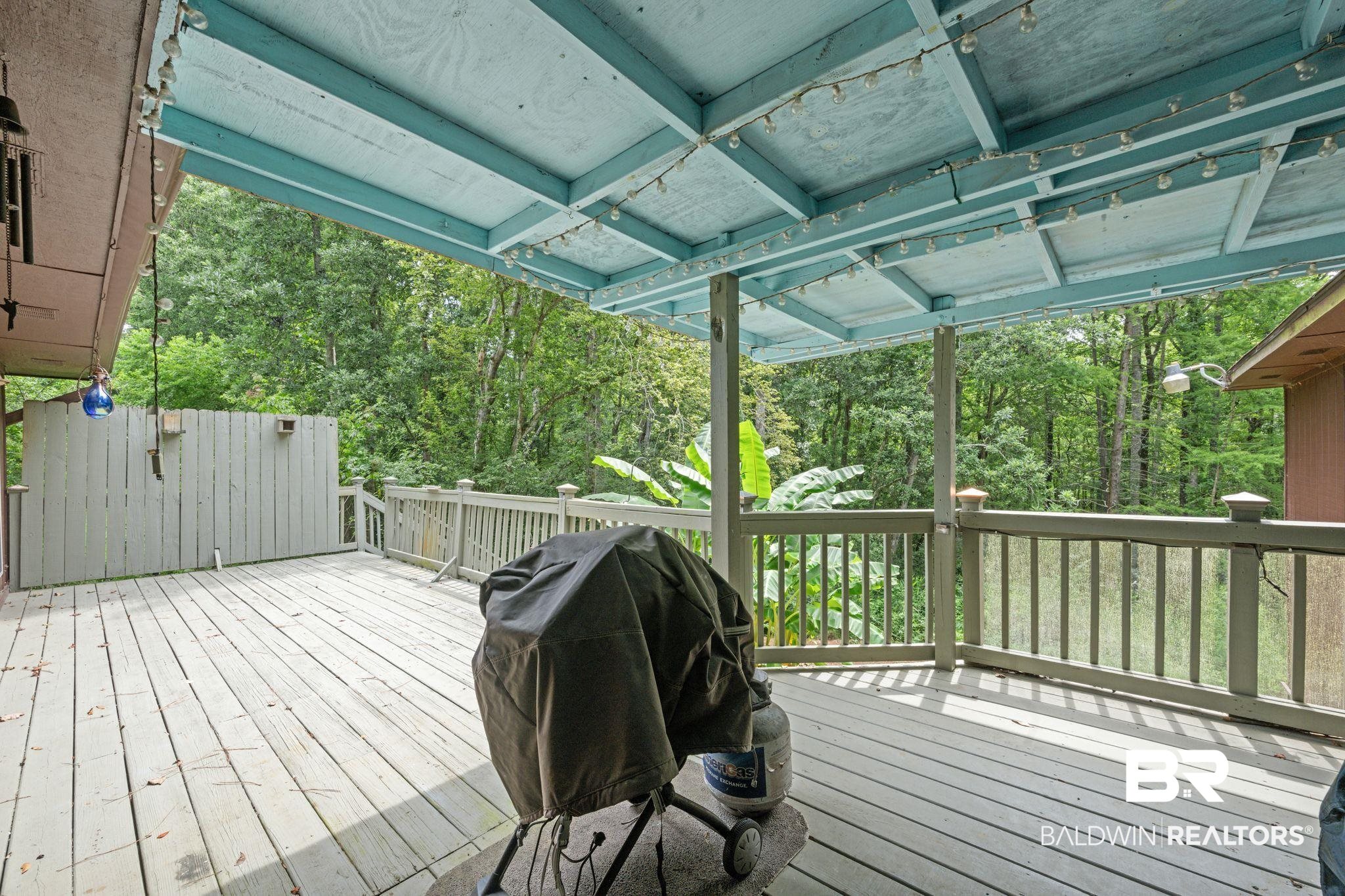 40 Caisson Trace Daphne, AL 36527 - Photo 36 of 54 Rear deck with covered seating area.