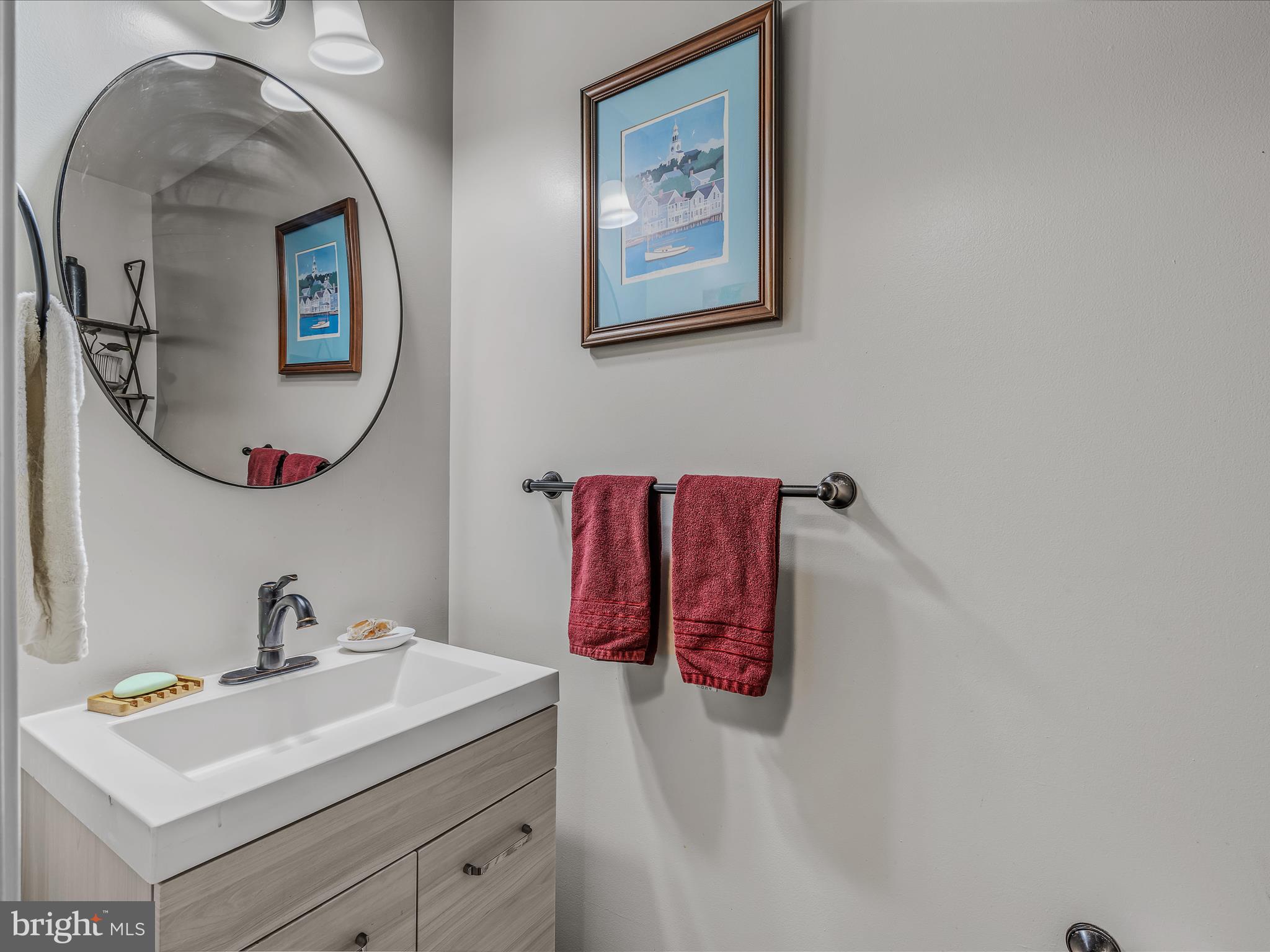 1212 Steed Street Ranson, WV 25438 - Photo 18 of 52 a bathroom with a sink and a mirror