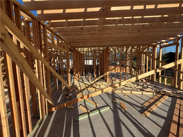 a view of a patio with table and chairs with wooden floor