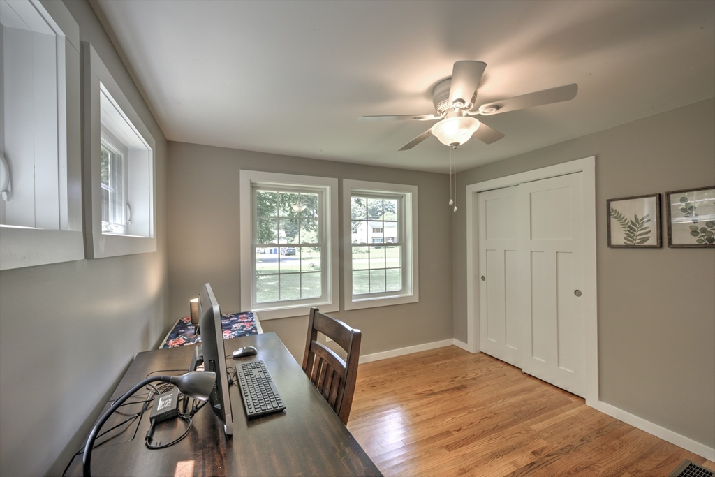 428 Bridge Road Northampton, MA 01062 - Photo 27 of 42 a view of a room with window and wooden floor