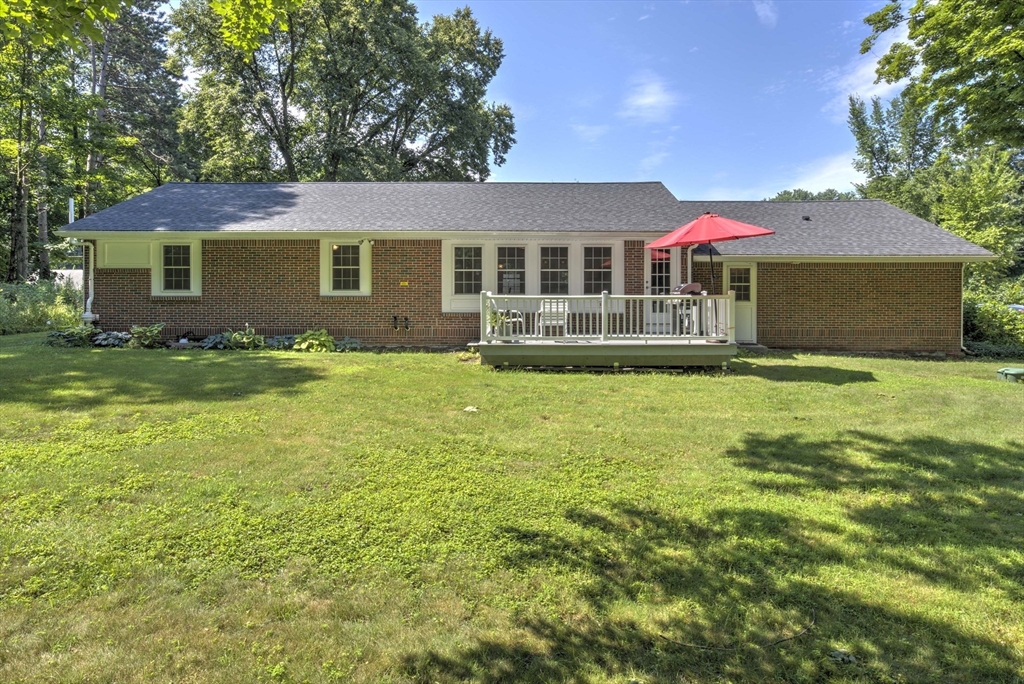 428 Bridge Road Northampton, MA 01062 - Photo 41 of 42 a front view of a house with yard and green space