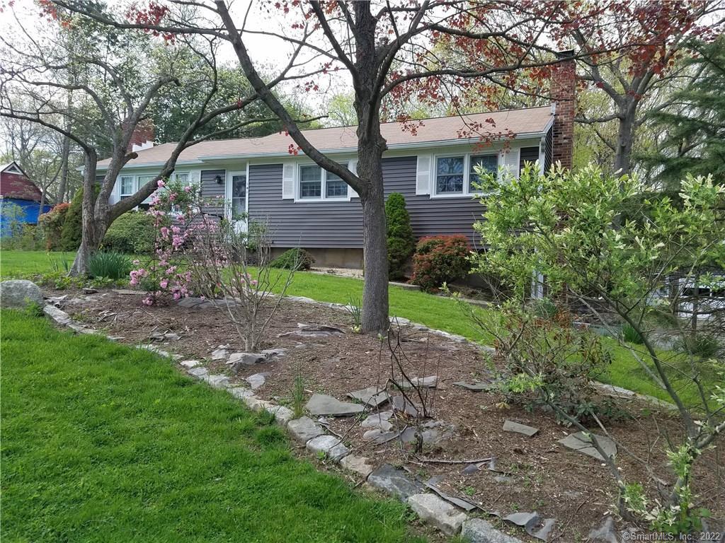 141 Buddington Road Shelton, CT 06484 - Photo 1 of 1 a front view of a house with garden