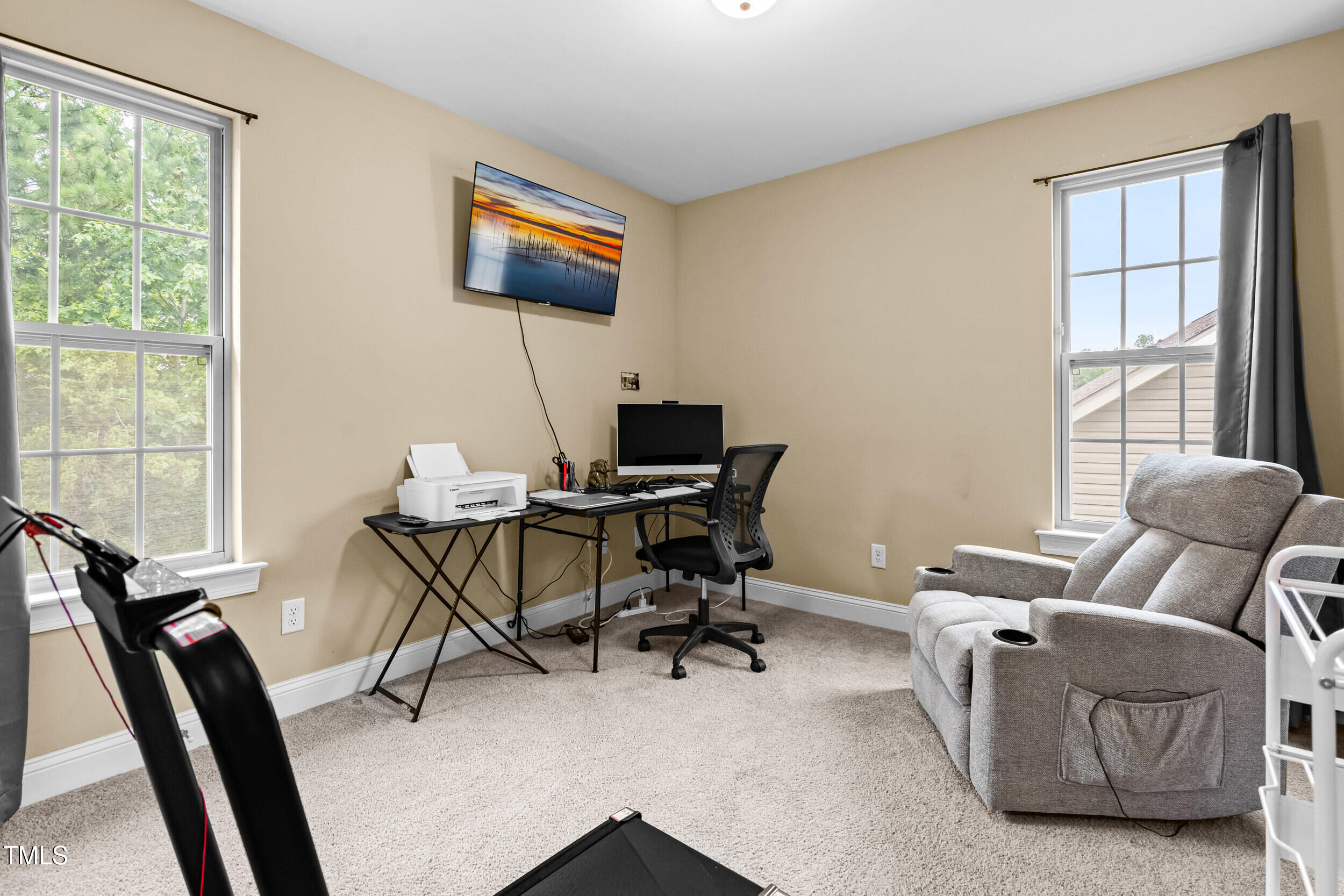 421 Angus Place Stem, NC 27581 - Photo 5 of 22 a work room with furniture and windows