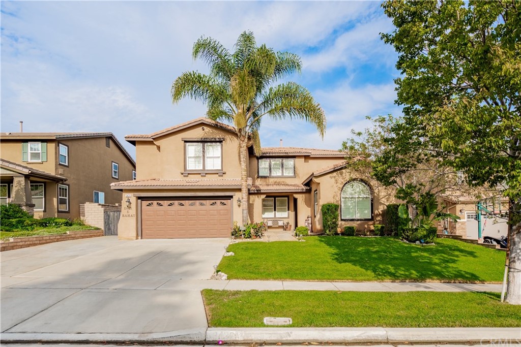 3426 Amethyst Street Corona, CA 92882 - Photo 1 of 72 a view of a house with a yard and a garage