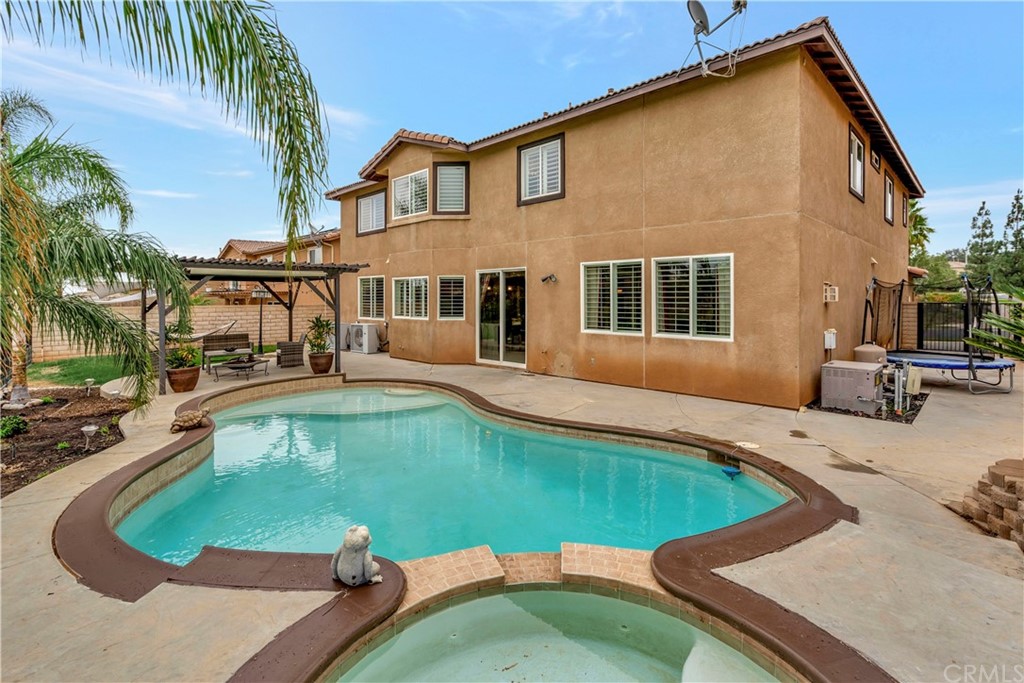 3426 Amethyst Street Corona, CA 92882 - Photo 3 of 72 a front view of a house with a yard