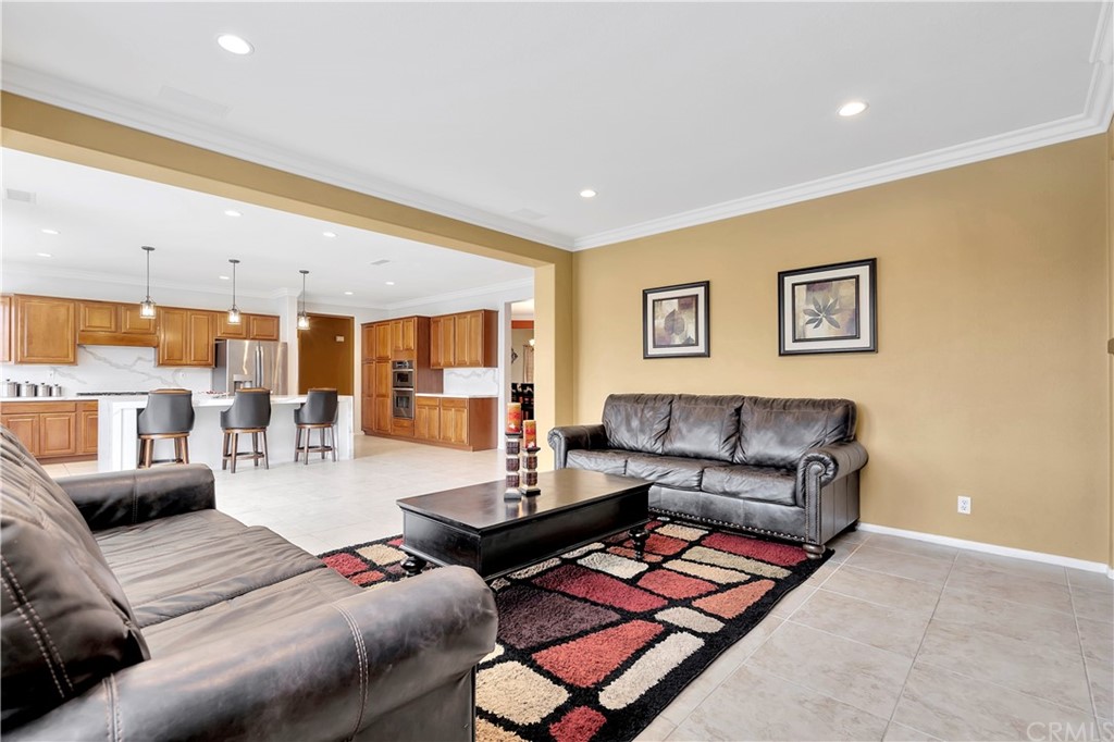 3426 Amethyst Street Corona, CA 92882 - Photo 23 of 72 an aerial view of a swimming pool with outdoor seating and yard