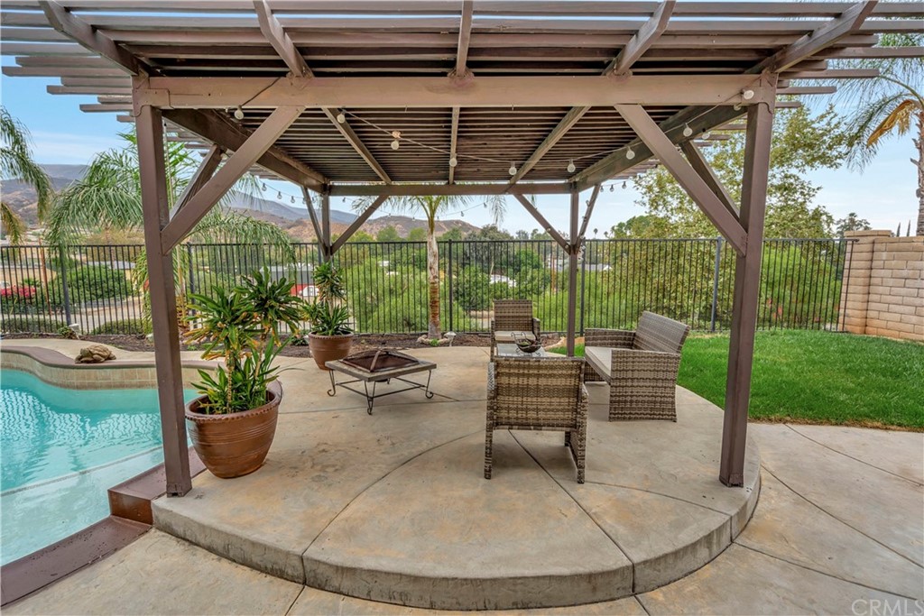 3426 Amethyst Street Corona, CA 92882 - Photo 27 of 72 a view of a backyard with sitting area