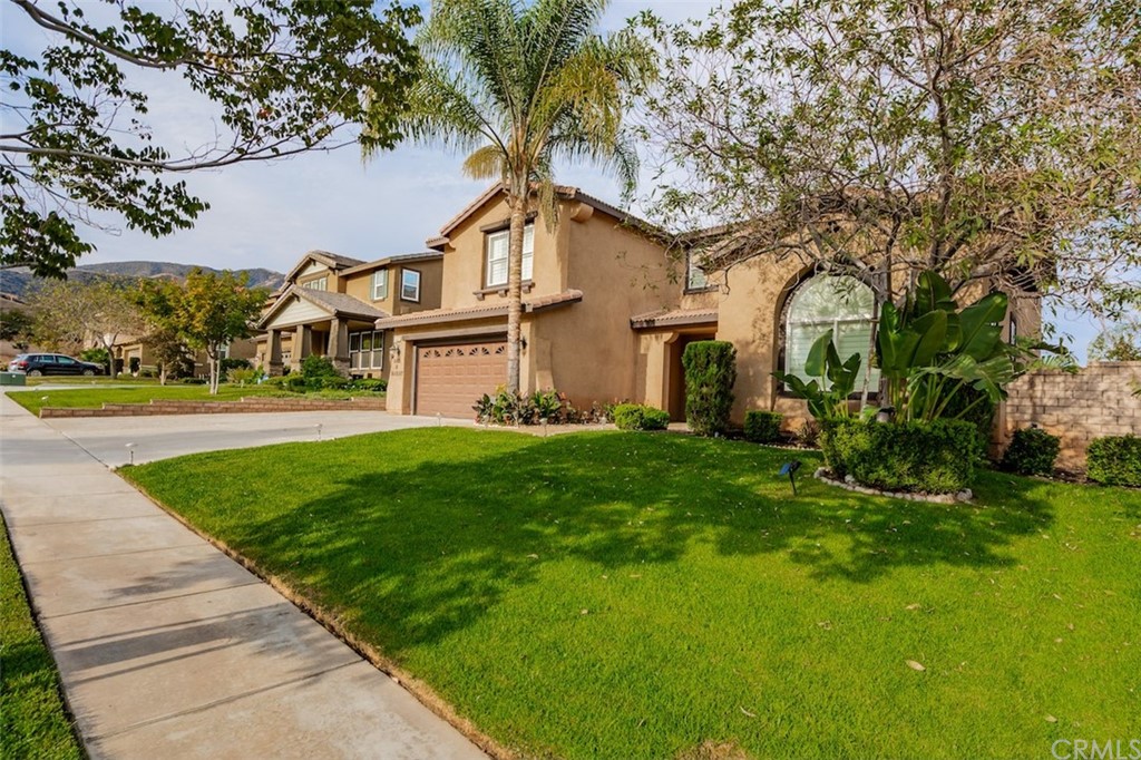 3426 Amethyst Street Corona, CA 92882 - Photo 30 of 72 a view of house with garden