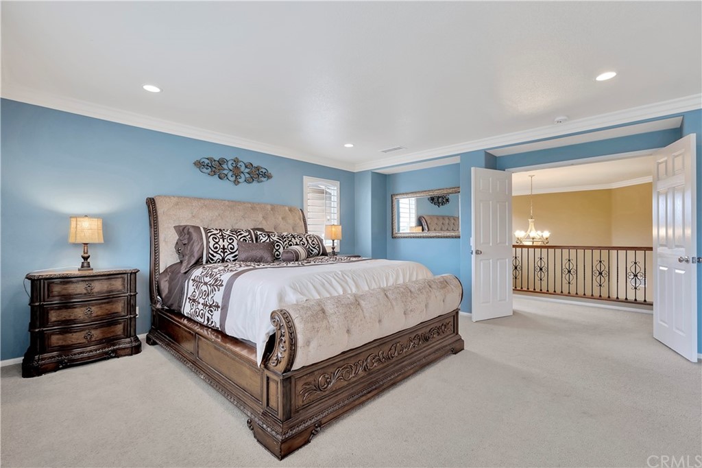 3426 Amethyst Street Corona, CA 92882 - Photo 36 of 72 a bed sitting in a spacious bedroom next to a window