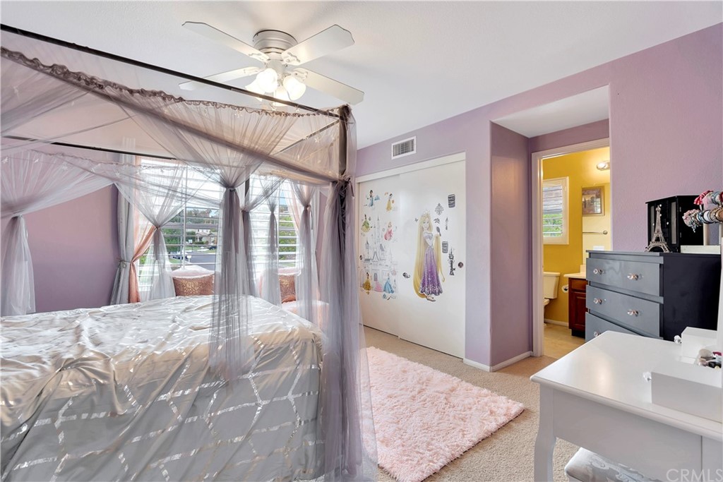 3426 Amethyst Street Corona, CA 92882 - Photo 45 of 72 a bed room with a bed and a television