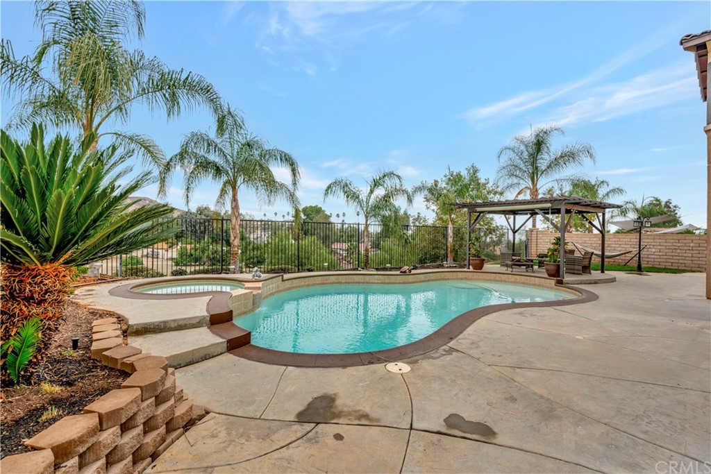 3426 Amethyst Street Corona, CA 92882 - Photo 6 of 72 a living room with furniture and a large window