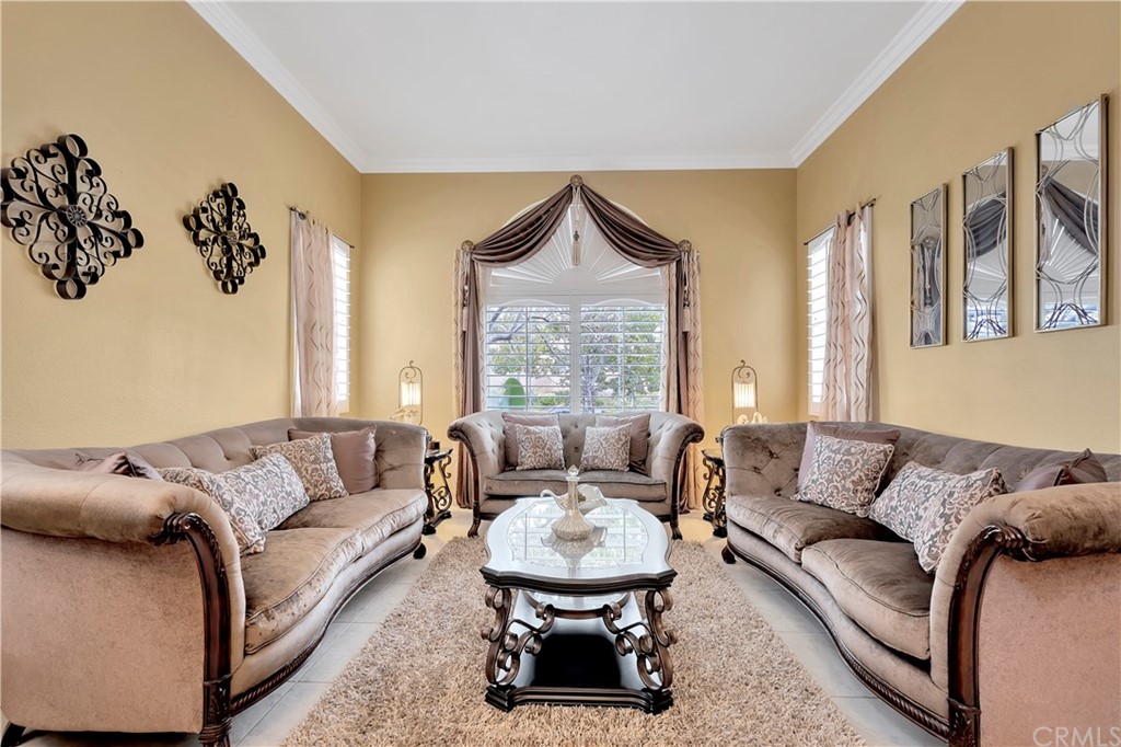 3426 Amethyst Street Corona, CA 92882 - Photo 52 of 72 a living room with furniture and a large window