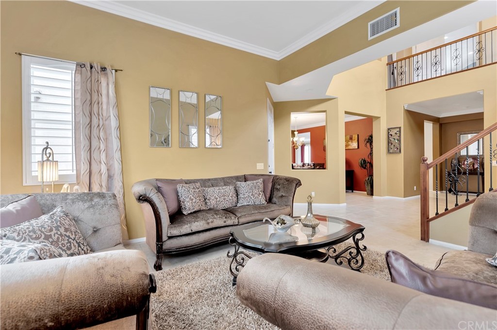 3426 Amethyst Street Corona, CA 92882 - Photo 53 of 72 a living room with furniture and a large window