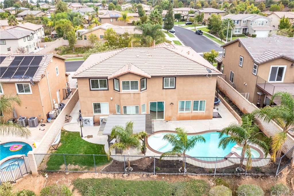 3426 Amethyst Street Corona, CA 92882 - Photo 64 of 72 an aerial view of a house with garden space and patio